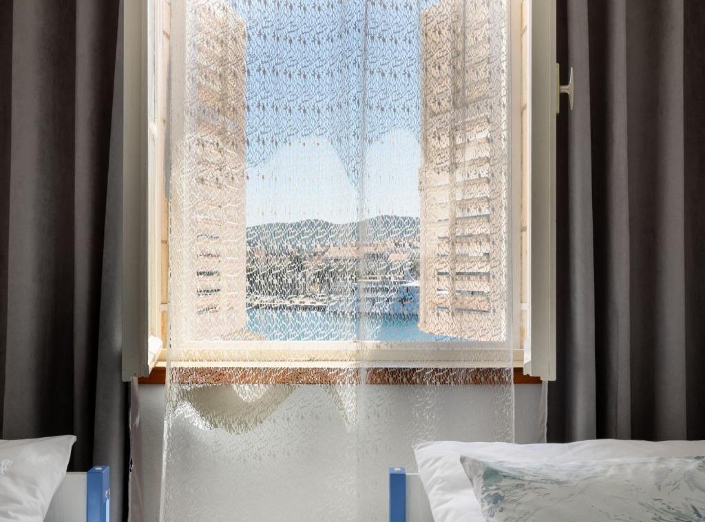 Posteľ alebo postele v izbe v ubytovaní Seaside Apartment Franica