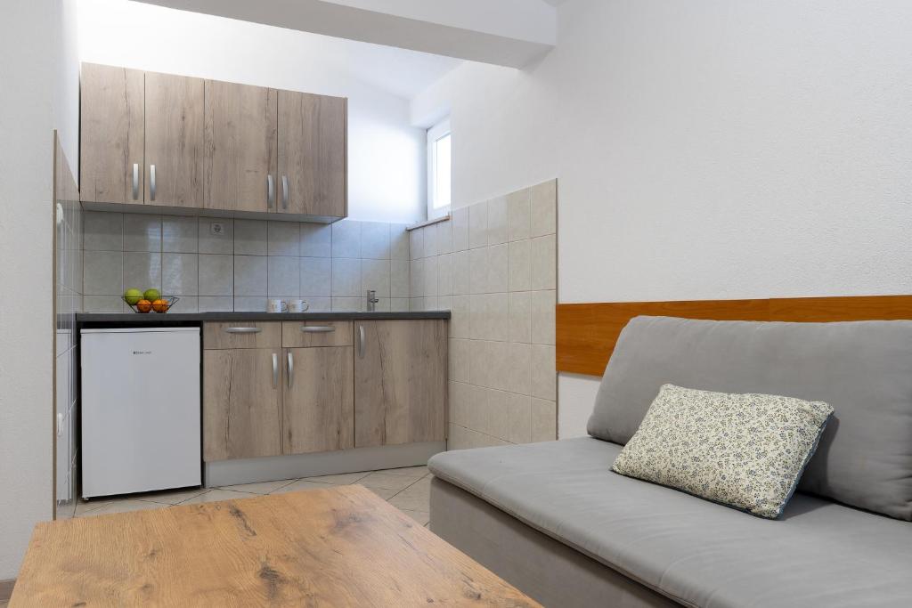 Kuchyň nebo kuchyňský kout v ubytování Apartments Obradović