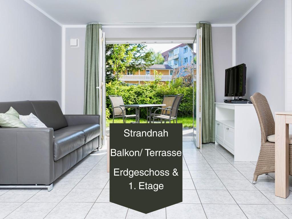 TV/trung tâm giải trí tại Ostsee-Traumferienwohnungen Villa Anika