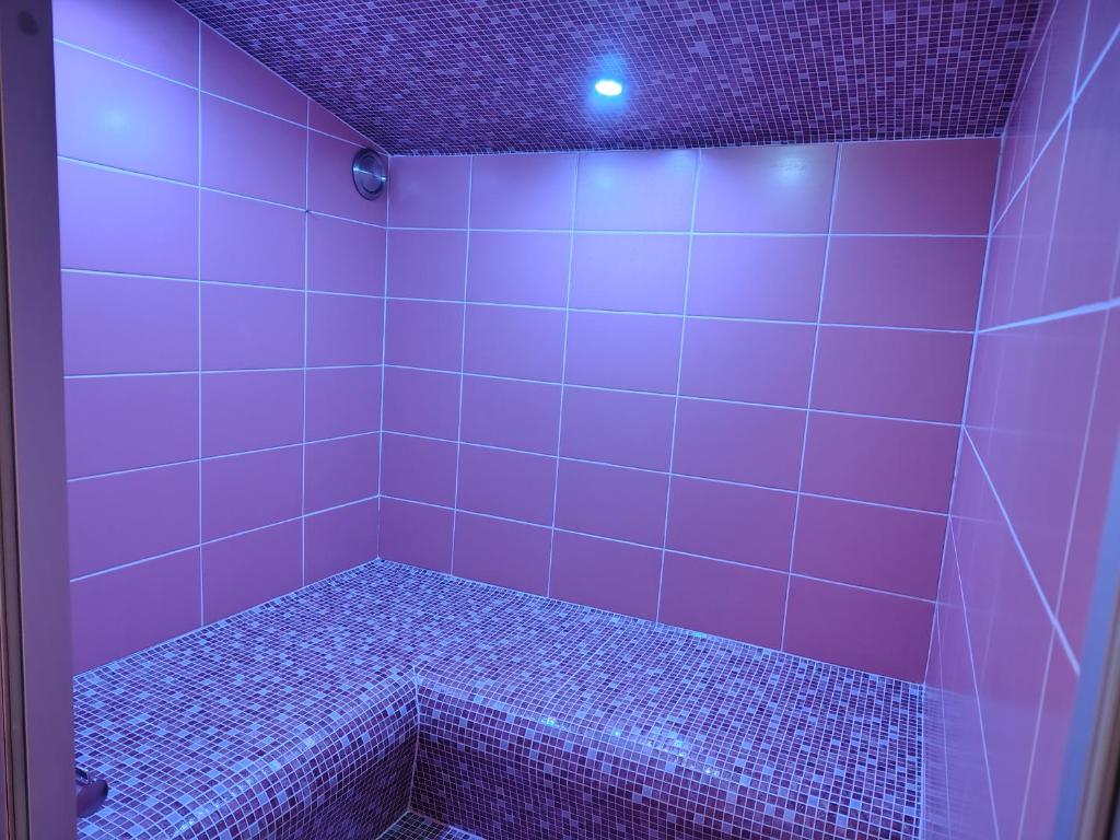 Postel nebo postele na pokoji v ubytování Le Spa est dans le Pré