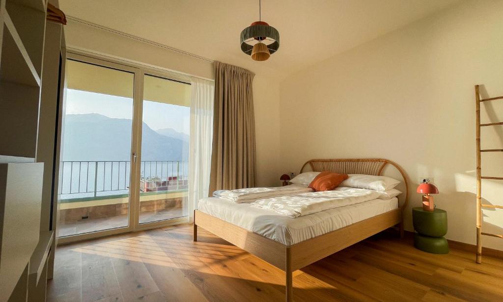 Postel nebo postele na pokoji v ubytování HomeTerra