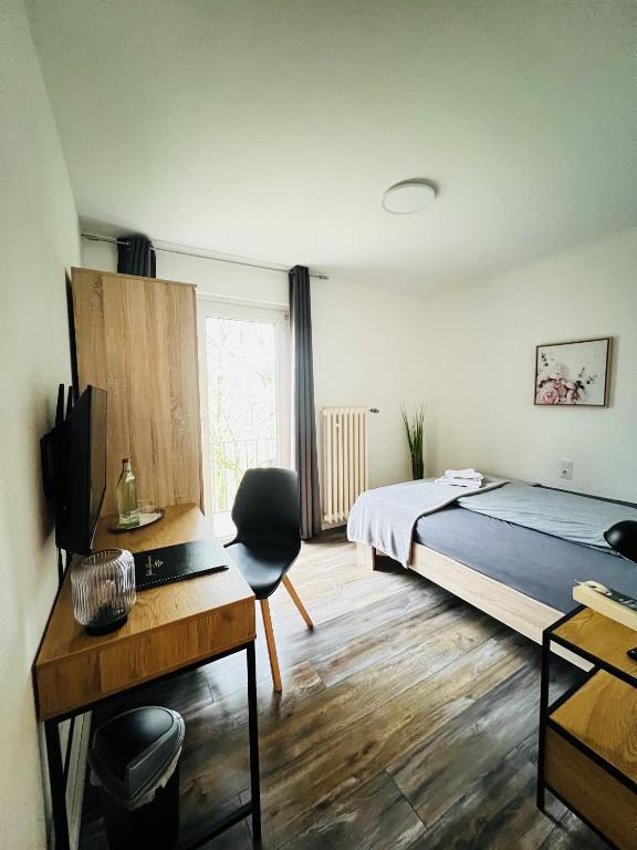 Postel nebo postele na pokoji v ubytování Pension Villa Pangea