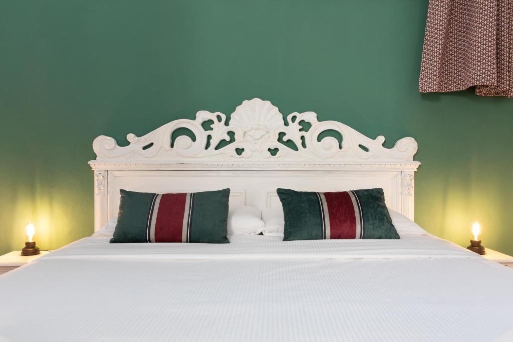 Posteľ alebo postele v izbe v ubytovaní In Piazza 'Apartments & Relax'
