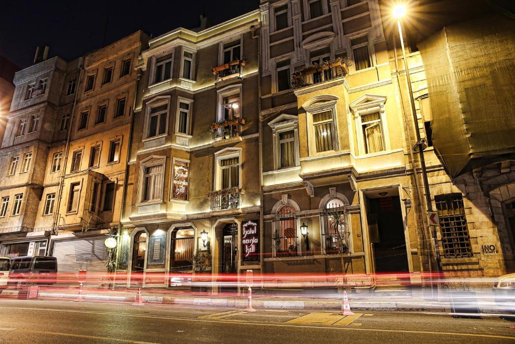 a building on a street at night with a street light at Hotel Santa Hill in Istanbul