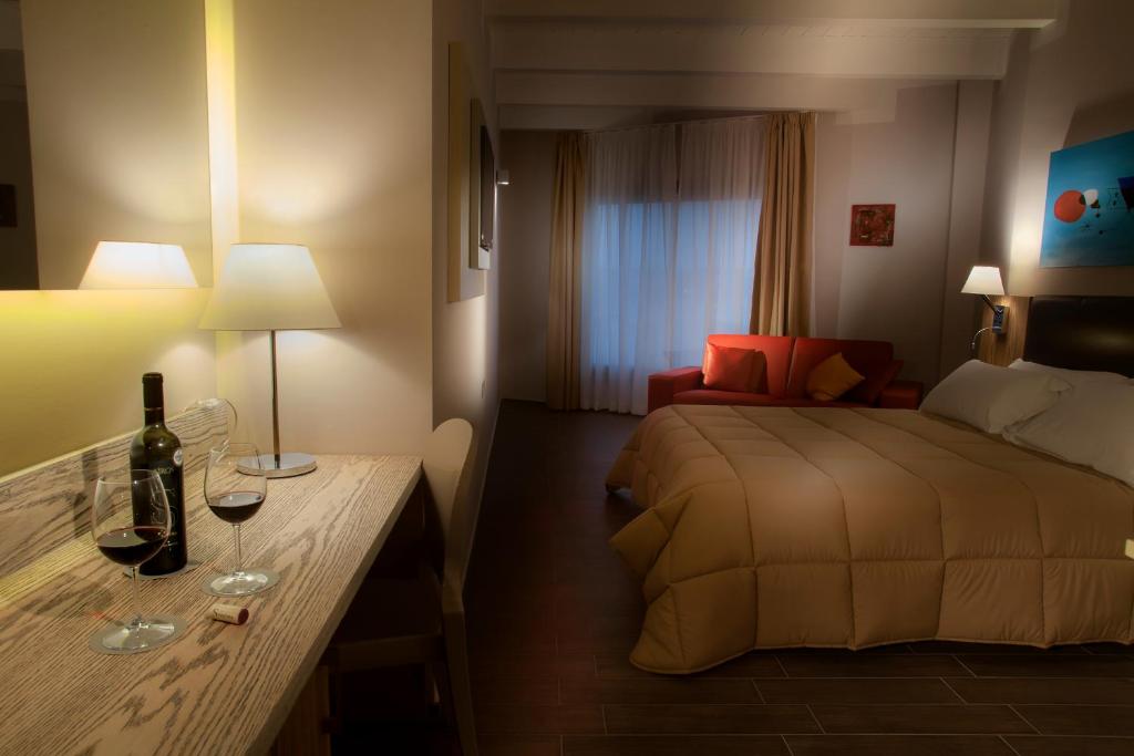 Cama ou camas em um quarto em La Maison D'Art