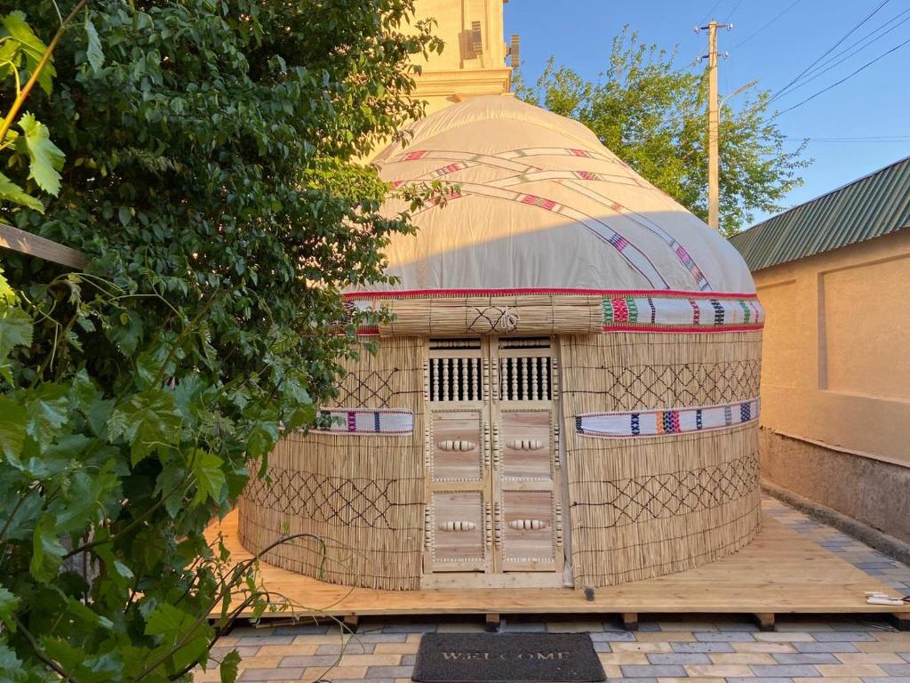 a large building with a dome on top of it at Yurta in Nukus
