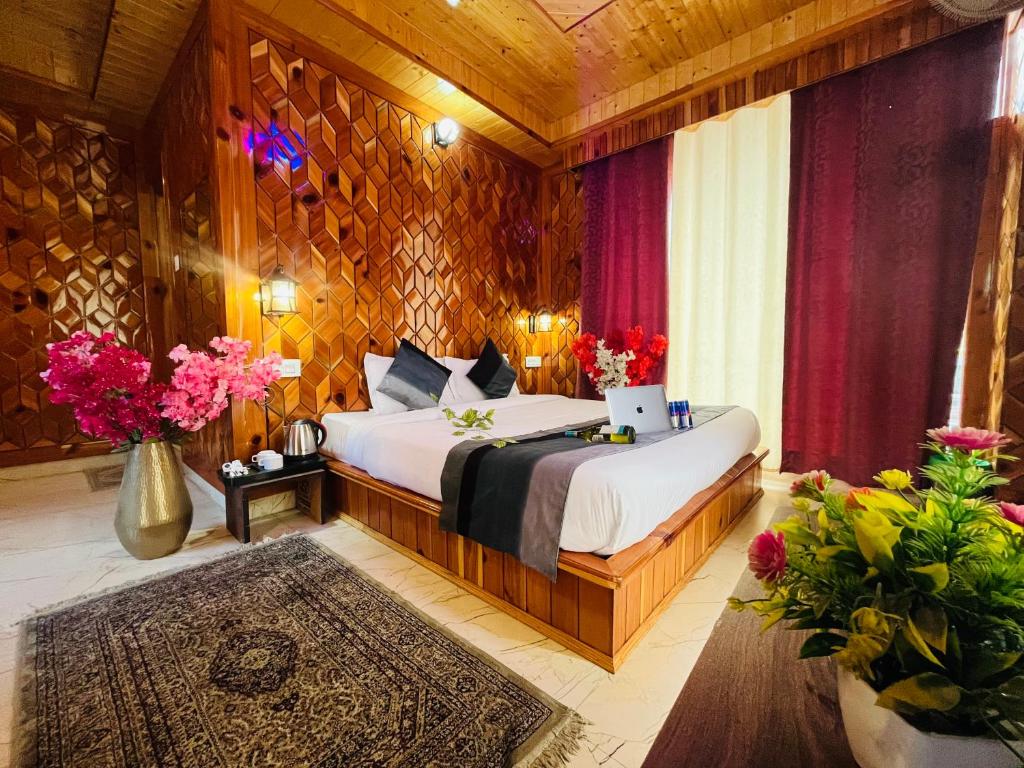 Postel nebo postele na pokoji v ubytování Hotel Brownie River View