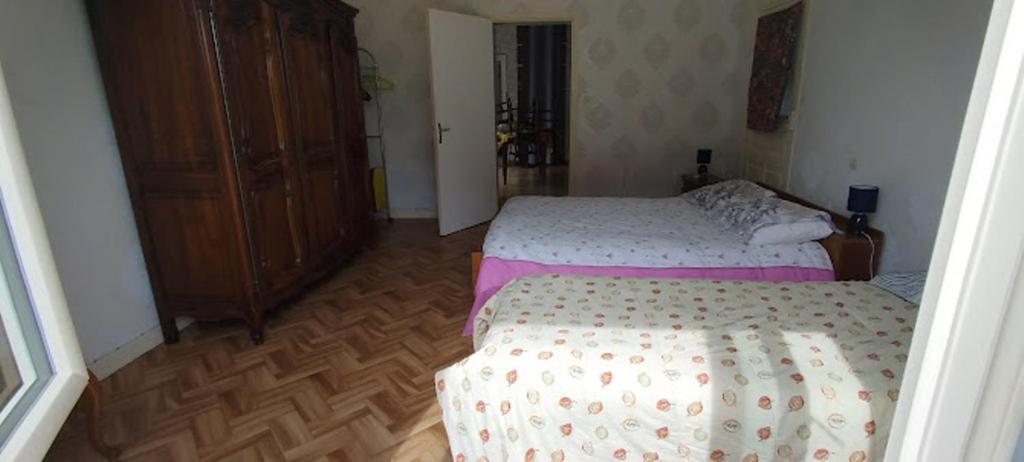 Postel nebo postele na pokoji v ubytování Gîte43