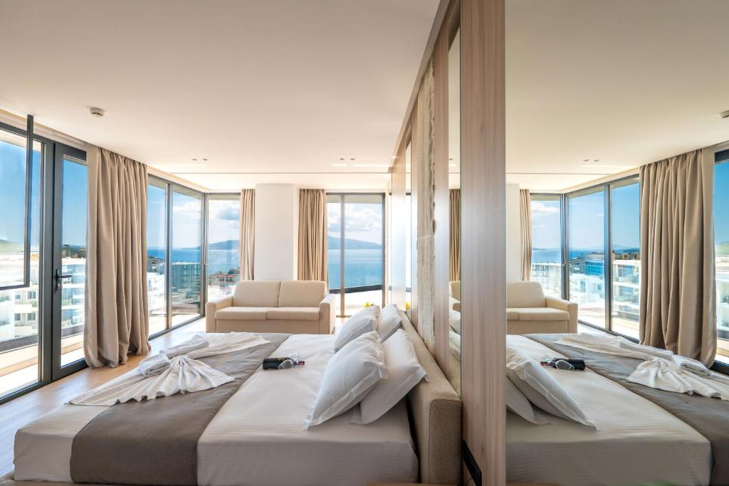 Ένα ή περισσότερα κρεβάτια σε δωμάτιο στο Jako Premium Hotel