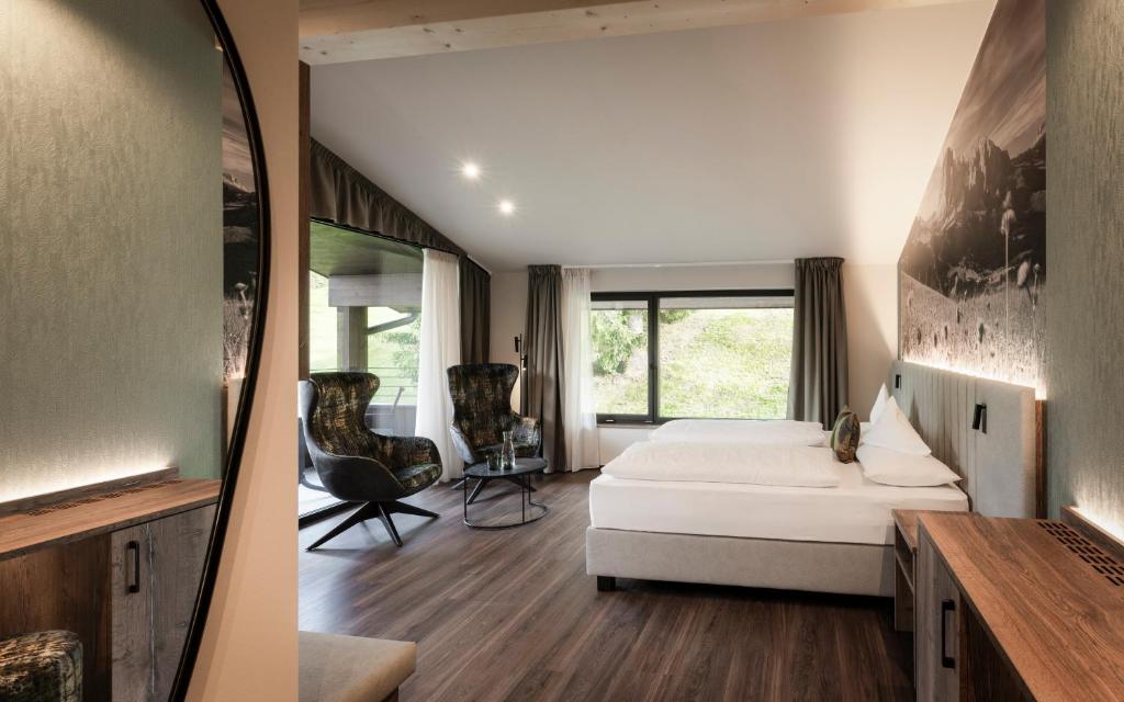 Postel nebo postele na pokoji v ubytování Hotel Belaval