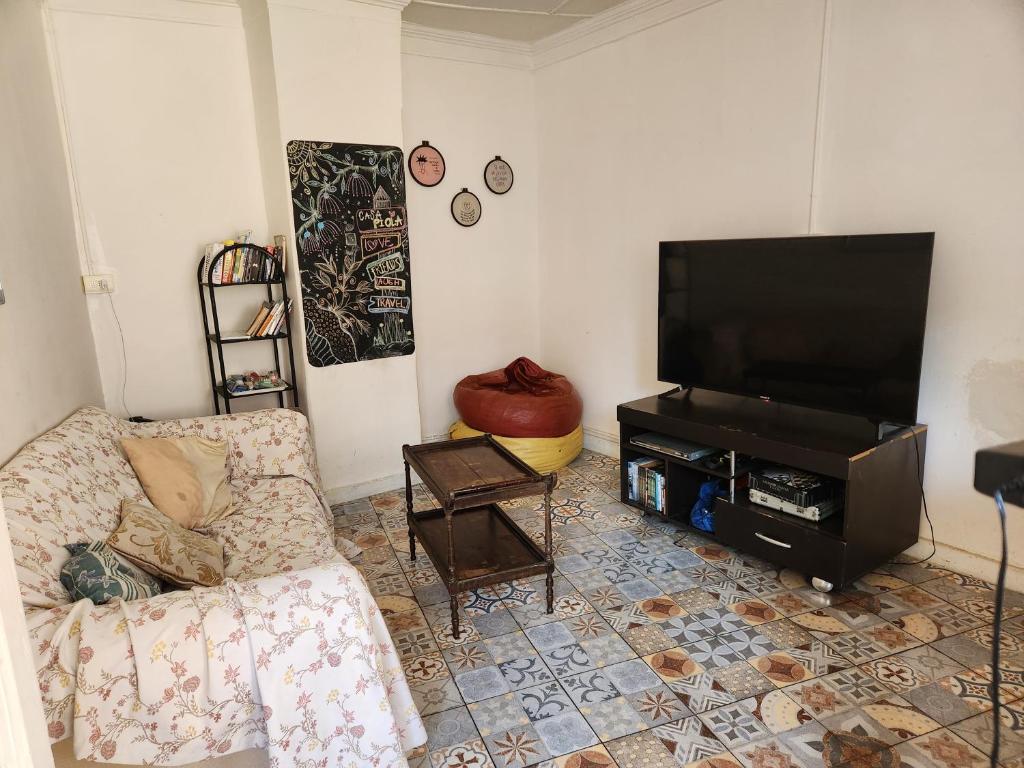 TV a/nebo společenská místnost v ubytování La Casa Piola