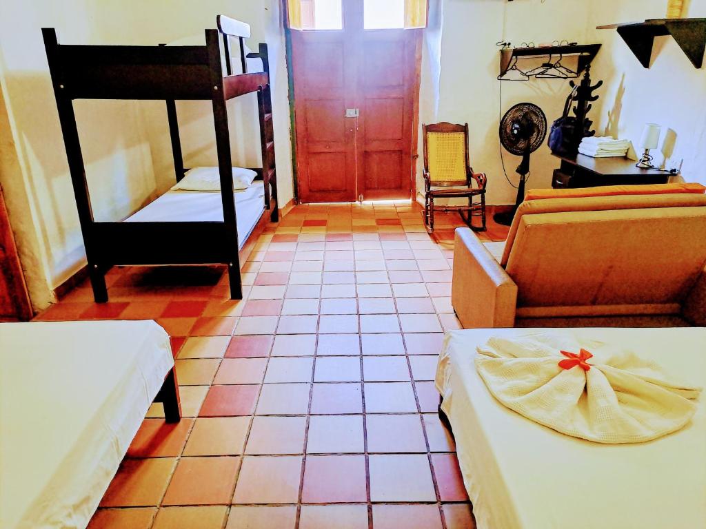 Postel nebo postele na pokoji v ubytování Hospedaje Don Juan