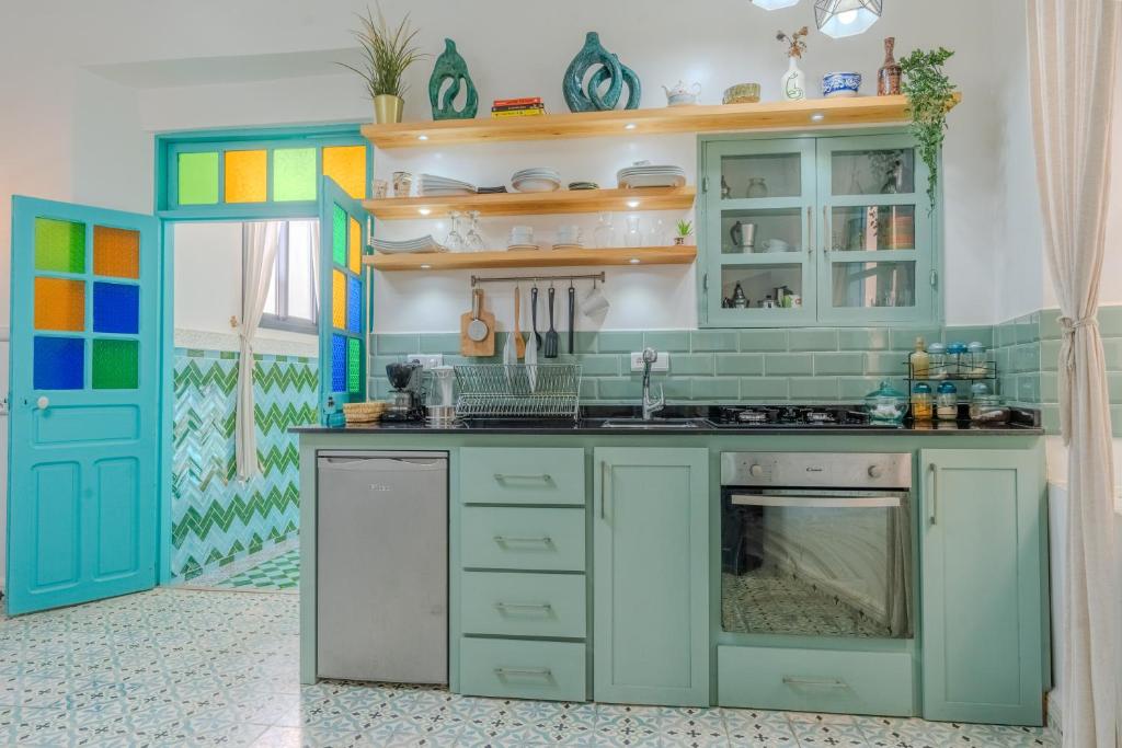Η κουζίνα ή μικρή κουζίνα στο Musta's Apartments & Suites Essaouira