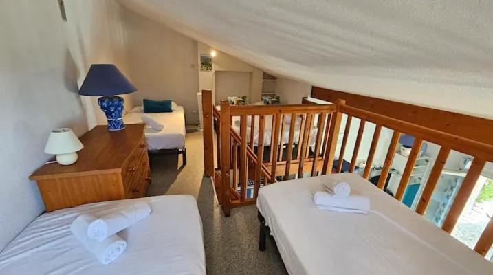 Postel nebo postele na pokoji v ubytování Maison Bord de Mer et Piscine