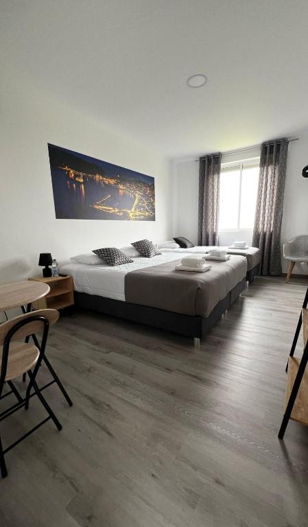 Postel nebo postele na pokoji v ubytování LN GuestHouse