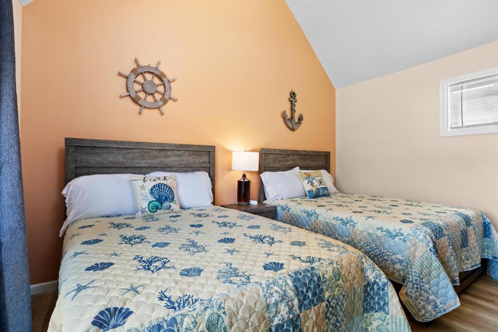 Ein Bett oder Betten in einem Zimmer der Unterkunft Ocean&#39;s Bliss at Arcadian Dunes