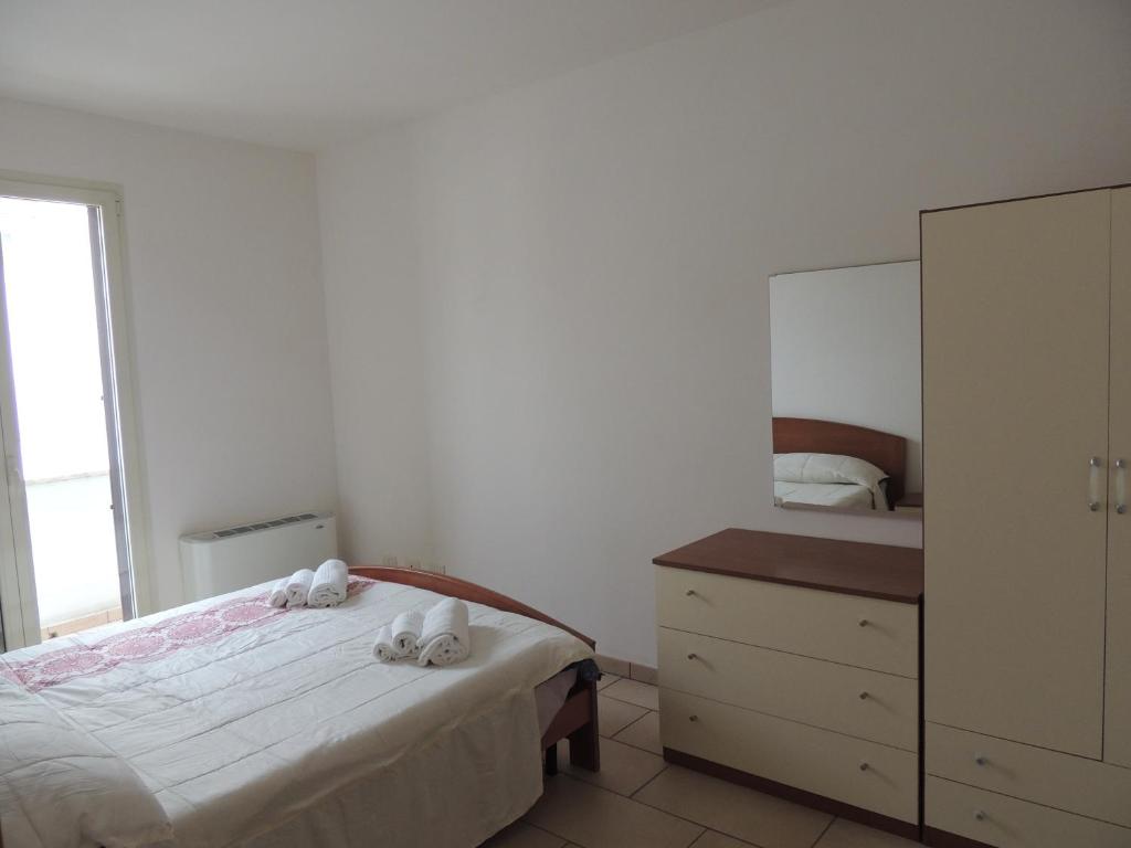Postel nebo postele na pokoji v ubytování Casa Vacanze Eufemia