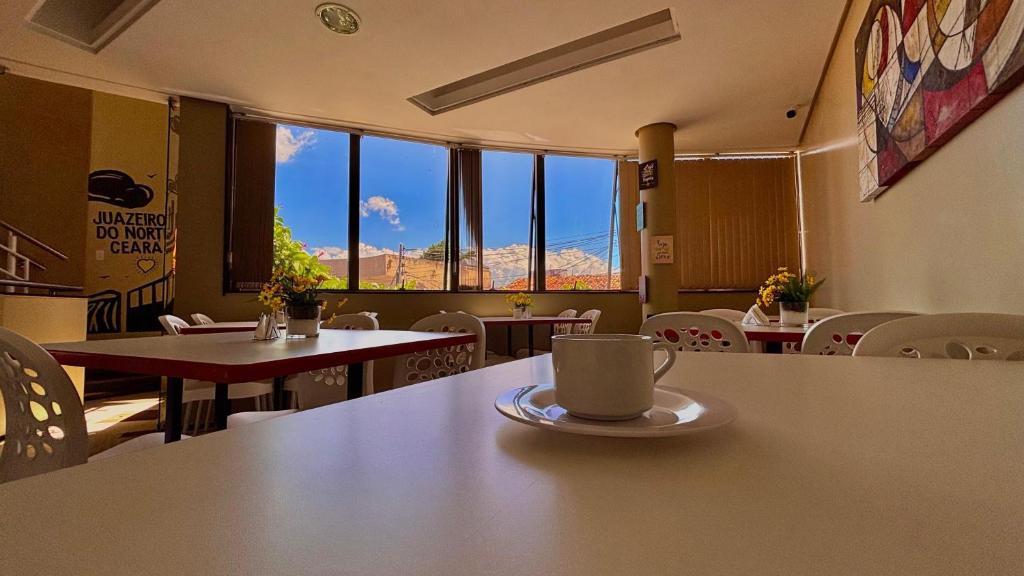 Uma área de estar em Sr Hotel