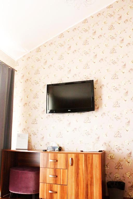 TV a/nebo společenská místnost v ubytování Hotel Papion