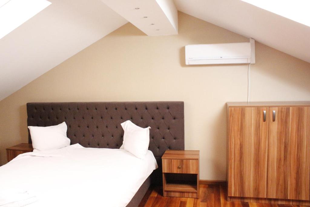 Postel nebo postele na pokoji v ubytování Hotel Papion