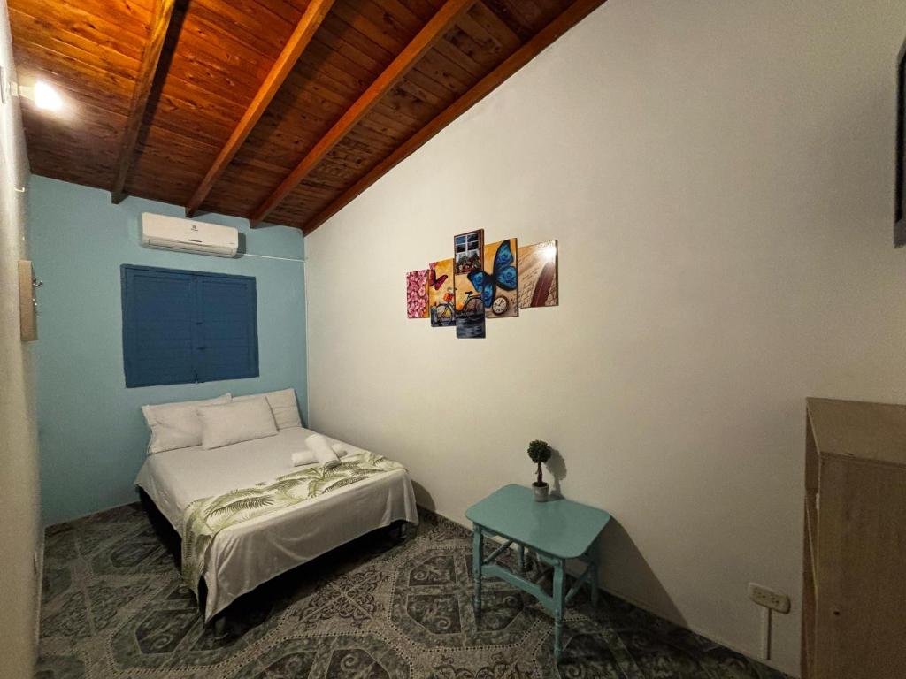 Postel nebo postele na pokoji v ubytování Cabaña Nro 80 El Portón de La Aldea
