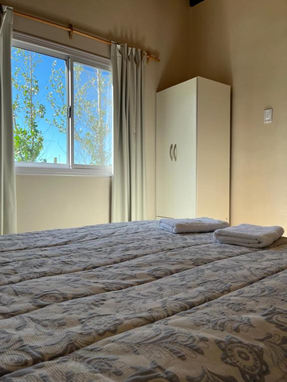 Postel nebo postele na pokoji v ubytování Finca La Calma
