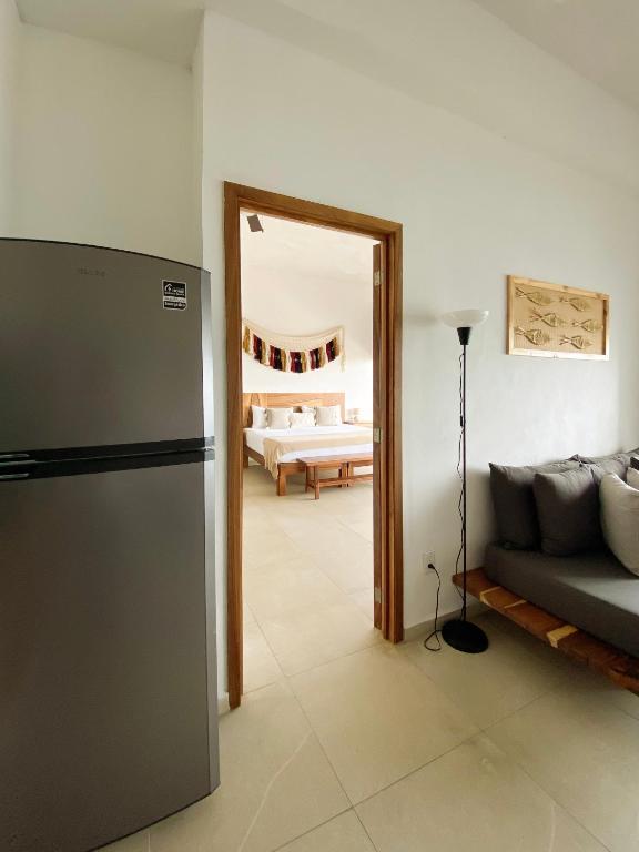 Postel nebo postele na pokoji v ubytování Itare Beach House