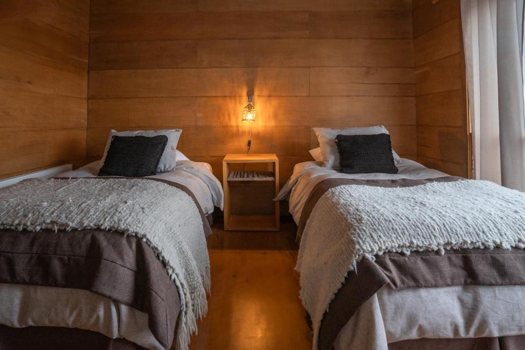 Letto o letti in una camera di Palafito Cucao