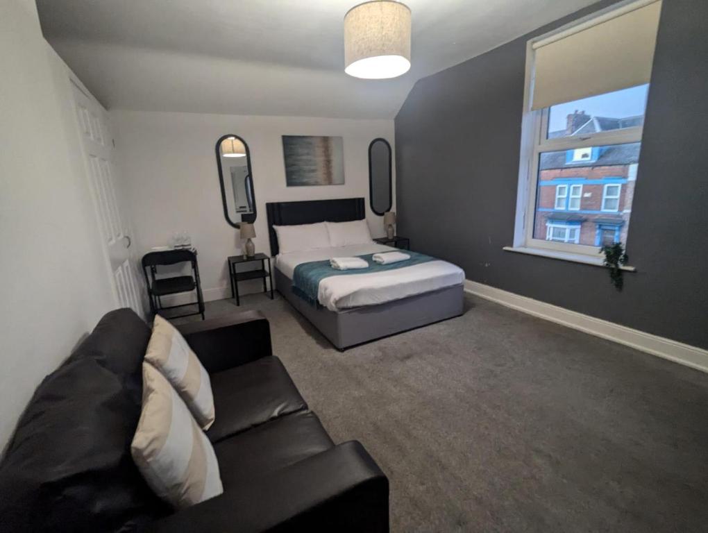 Ένα ή περισσότερα κρεβάτια σε δωμάτιο στο Contractor Rooms South Shields