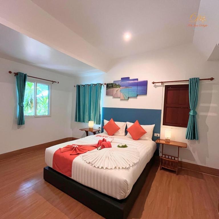 Postel nebo postele na pokoji v ubytování Koh Jum Delight Beach