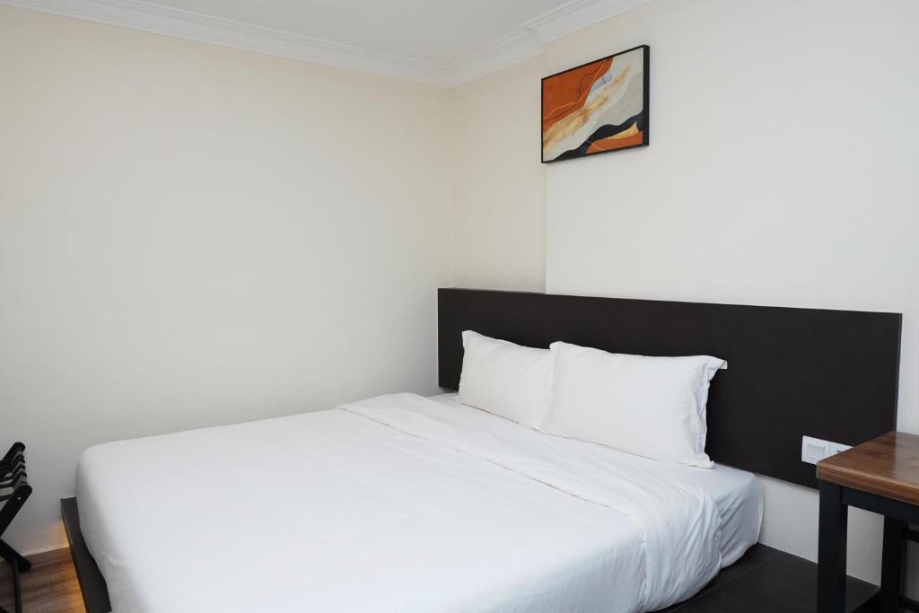 Postel nebo postele na pokoji v ubytování Anta Hotel
