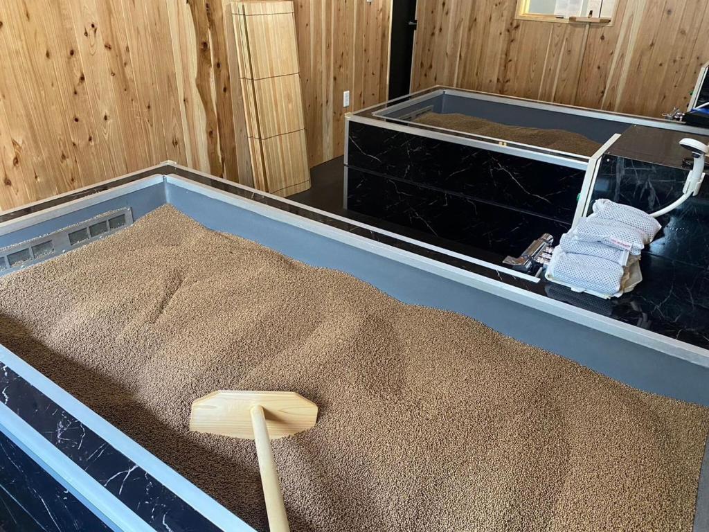 Postel nebo postele na pokoji v ubytování SANDBoX