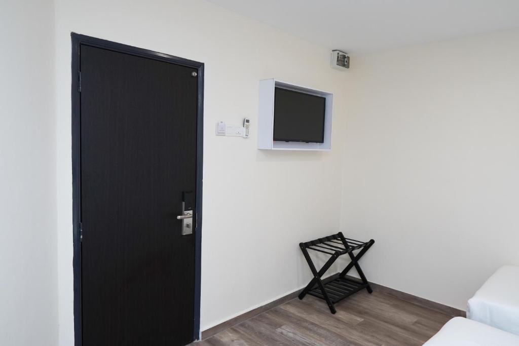 TV a/nebo společenská místnost v ubytování Anta Hotel