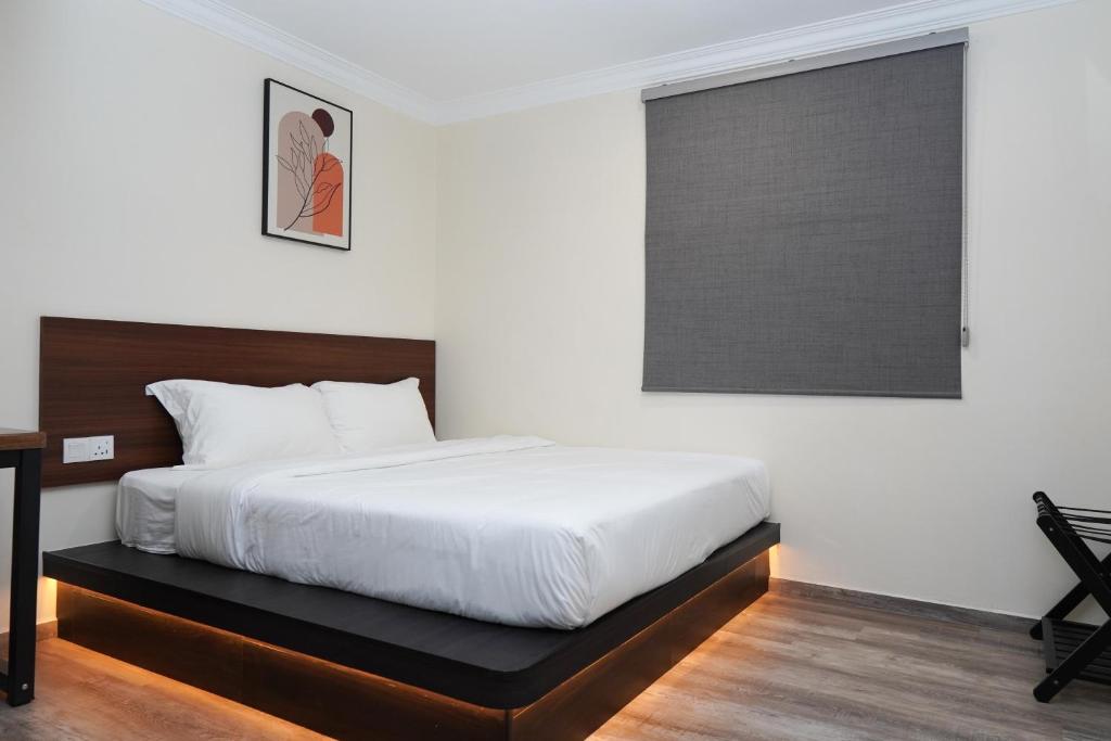 Postel nebo postele na pokoji v ubytování Anta Hotel