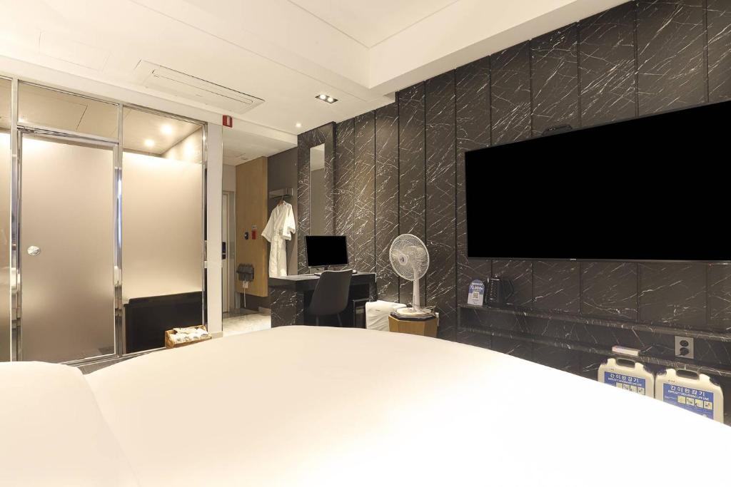 TV a/nebo společenská místnost v ubytování Hotel OSCAR