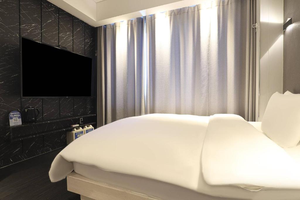 TV a/nebo společenská místnost v ubytování Hotel OSCAR