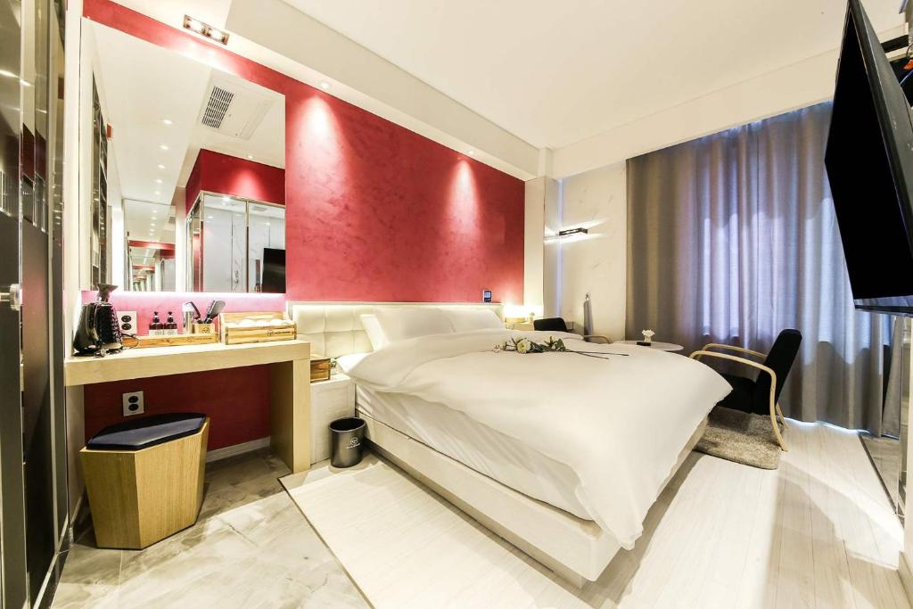 Postel nebo postele na pokoji v ubytování Hotel OSCAR