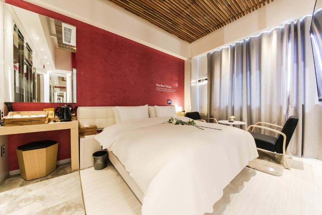 Postel nebo postele na pokoji v ubytování Hotel OSCAR