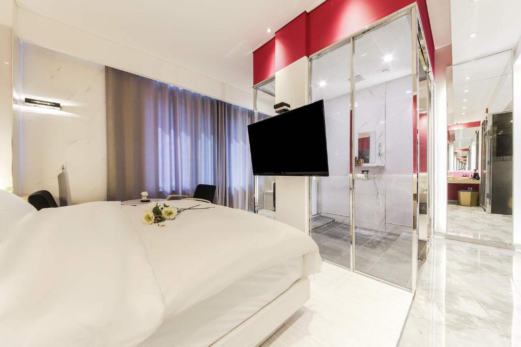 TV a/nebo společenská místnost v ubytování Hotel OSCAR