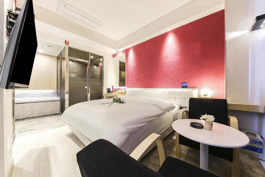 Postel nebo postele na pokoji v ubytování Hotel OSCAR
