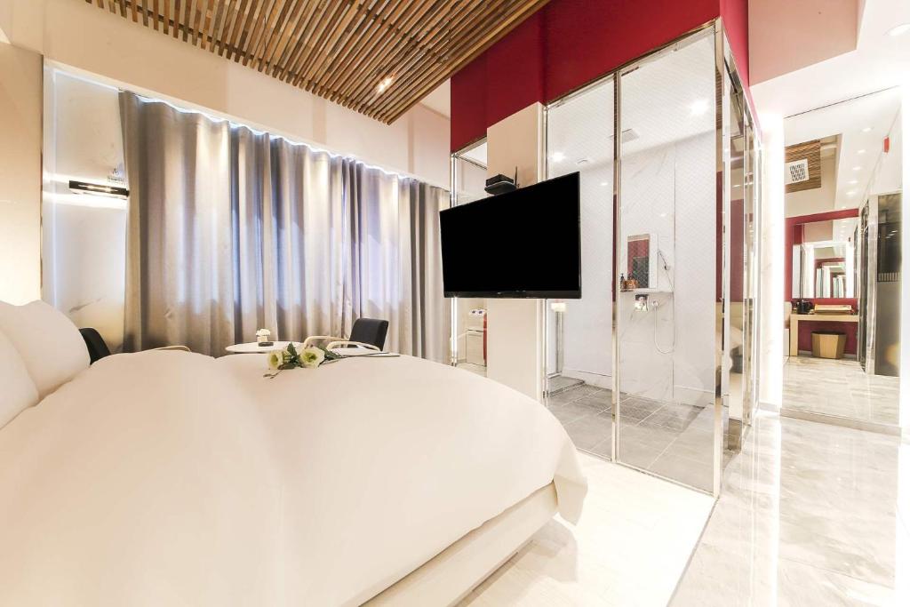 TV a/nebo společenská místnost v ubytování Hotel OSCAR