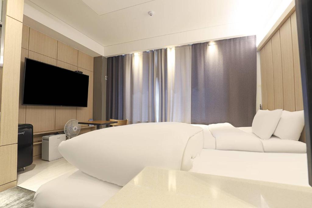 TV a/nebo společenská místnost v ubytování Hotel OSCAR