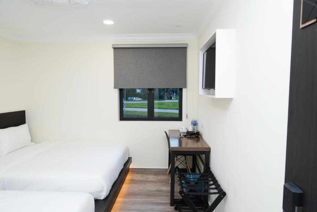 Postel nebo postele na pokoji v ubytování Anta Hotel
