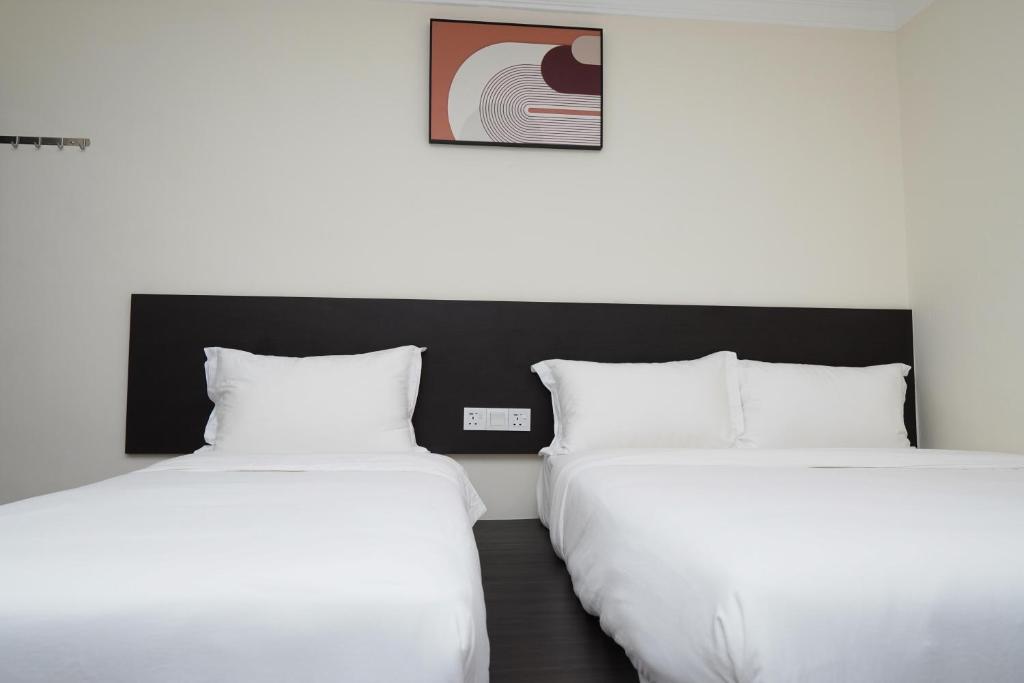 Postel nebo postele na pokoji v ubytování Anta Hotel