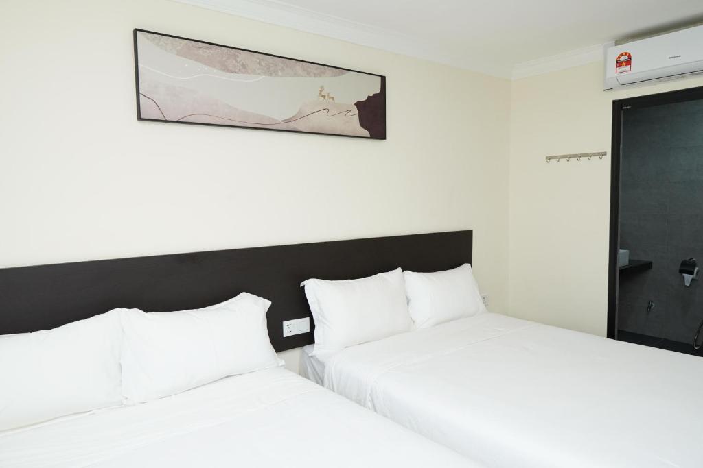 Postel nebo postele na pokoji v ubytování Anta Hotel