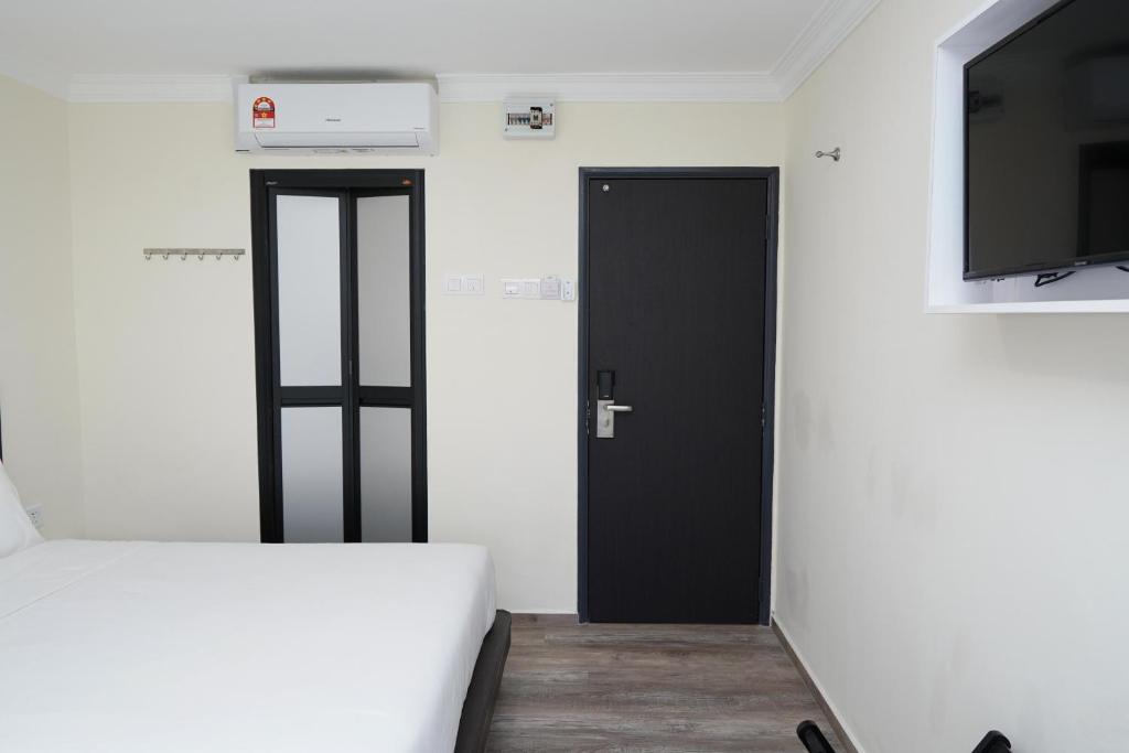 Postel nebo postele na pokoji v ubytování Anta Hotel