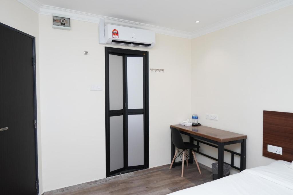 Postel nebo postele na pokoji v ubytování Anta Hotel