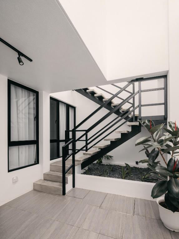 Foto sihtkohas Jelutong asuva majutusasutuse Romantic Rooftop Jacuzzi Villa with Sunset Views galeriist