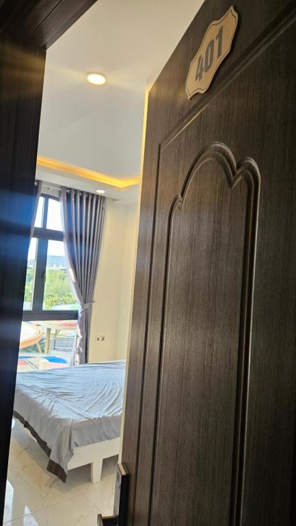 Кровать или кровати в номере ADRI Hotel