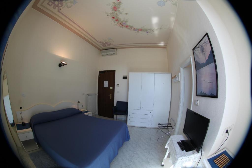 TV a/nebo společenská místnost v ubytování Hotel Stella